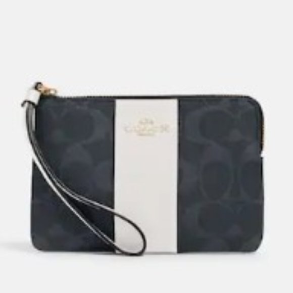 Coach Handbags - NWT Coach Blue Coated Canvas Wristlet